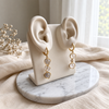 Cat Eye Oval Huggie Earrings - image 1